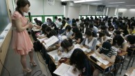 English teacher Rose Lee gives a lecture at a cram school in Seoul